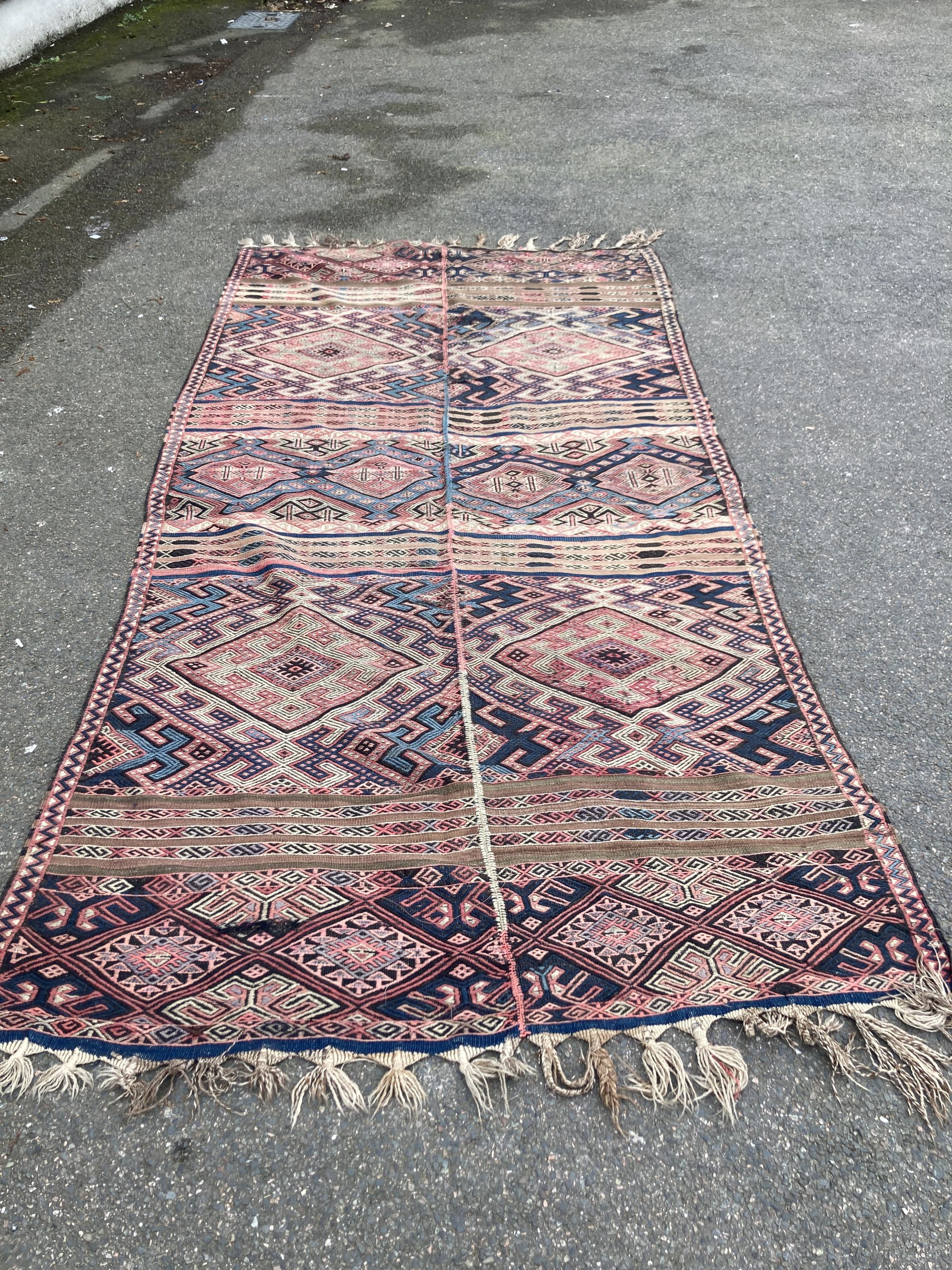 A Kelim flatweave carpet, 356 x 180cm